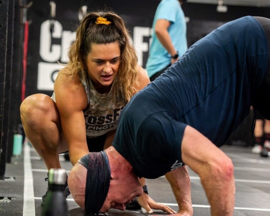 Pursue Objectives, Not Distractions 1 Coach helping an athlete